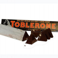 Tempting Toblerone Swiss Dark Chocolate: Delight in Divine Honey and Almond Nougat in a 600gm, 6pcs Bar